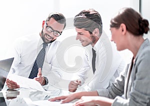 Professional business team discusses the terms of the contract