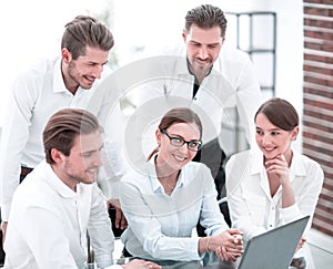 Professional business team sitting at the Desk in the office