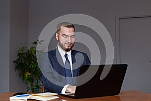 Professional  businessman is working on new project on his computer