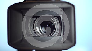 Professional camcorder. Panning And Zooming Video Camcorder Lens