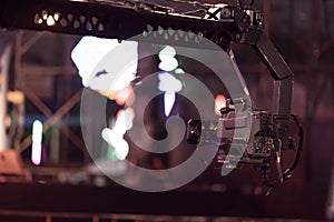 Professional camera on crane record live concert outdoors