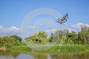 Professional camera drone fast flying.