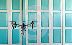 Professional camera drone flying.