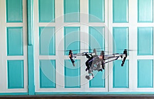 Professional camera drone flying.