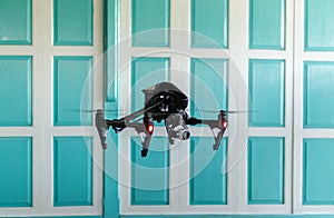 Professional camera drone flying.