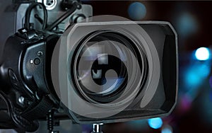 Professional video camera on dark background