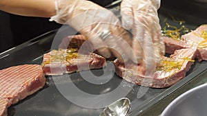 Professional chef hands Preparing red fish tuna