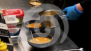 Professional chef prepares delicious miso soup of japanese cuisine in the restaurant