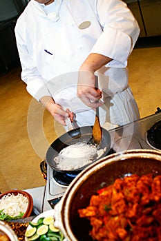 Professional Chef Preparing Dishes photo