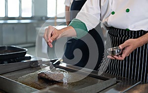 Professional chef who specializes in fine meats The steak that is served to the customer is unquestionably delicious.