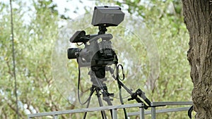 Professional cinema camera set in outdoor environment