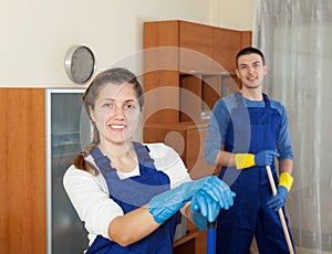 Professional cleaners in uniform