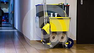 Professional cleaning equipment in corridor.