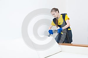 professional cleaning service. Two women in working uniform, in aprons. Two women in working uniform, in aprons, divide