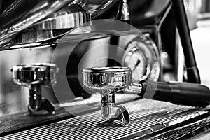 Professional coffee machine making espresso in a cafe