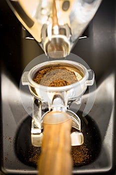 Professional coffee mill machine for making espresso in a cafe