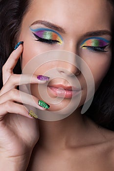 Professional colourful make-up and manicure