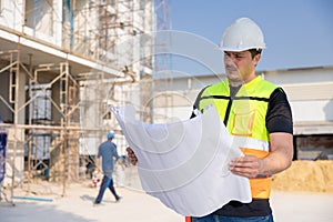 Professional construction worker engineer male. Real estate house project builder. Smart architect man standing work in