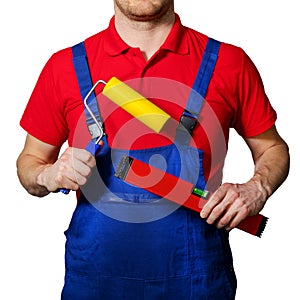 Professional construction worker with tools in hands