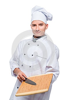 Professional cook with cutting board and knife, portrait on white background