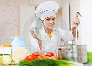 Professional cook in her kitchen