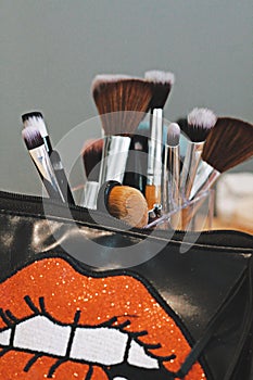 Professional cosmetics set on make up artist work place