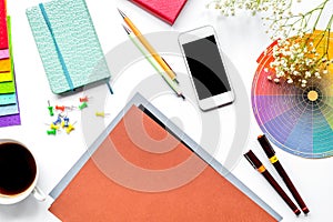 Professional creative graphic designer desk on white background