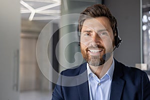 Professional customer service rep with headset in modern office