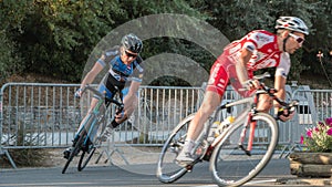 Professional cyclist in a corner at full speed