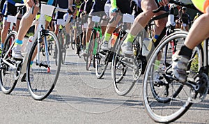 professional cyclists engaged in a road race