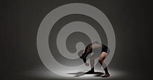 Professional Dancer Performs on a Gray Background