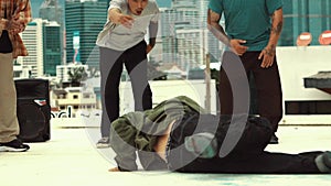 Professional dancer practice B boy dance with friends at roof top. hiphop.