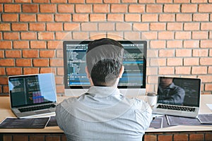 Professional Developer programmer working a software website design and coding technology, writing codes and database in company