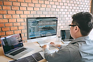 Professional Developer programmer working a software website design and coding technology, writing codes and database in company