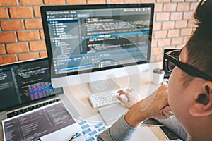 Professional Developer programmer working a software website design and coding technology, writing codes and database in company