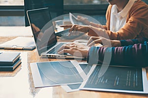 Professional Development programmer cooperating meeting and brainstorming and programming website working in a software and