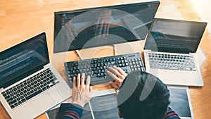 Professional Development programmer working in programming website a software and coding technology, writing codes and data