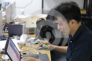 Professional Development programmer working in programming website a software and coding technology, writing codes and data.
