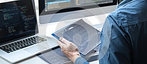 Professional Development programmer working in programming website a software and coding technology, writing codes and data code,