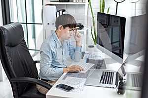 Professional development programmers are sit on a desk with work equipment