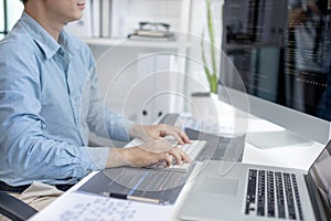 Professional development programmers are sit on a desk with work equipment