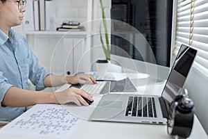 Professional development programmers are sit on a desk with work equipment