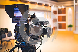 Professional digital video camera in studio