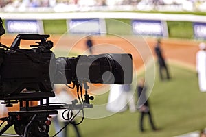 Professional digital video camera. tv camera in a sport event.