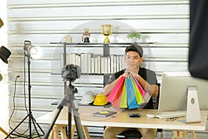 Professional digital video cameras filming male vlog for online sales