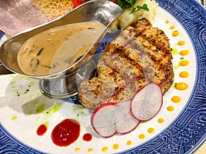 The professional displayed of pork steak on the plate