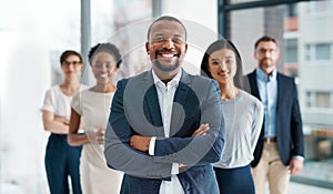 Professional, diverse and successful business team smiling and standing together in an office. Happy, formal and