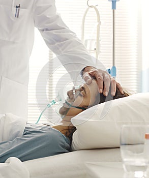 Professional doctor assisting a patient at the hospital