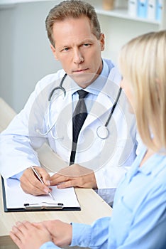 Professional doctor examining his patient