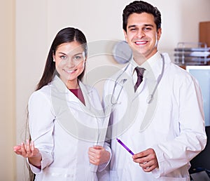 Professional doctors smiling in clinic